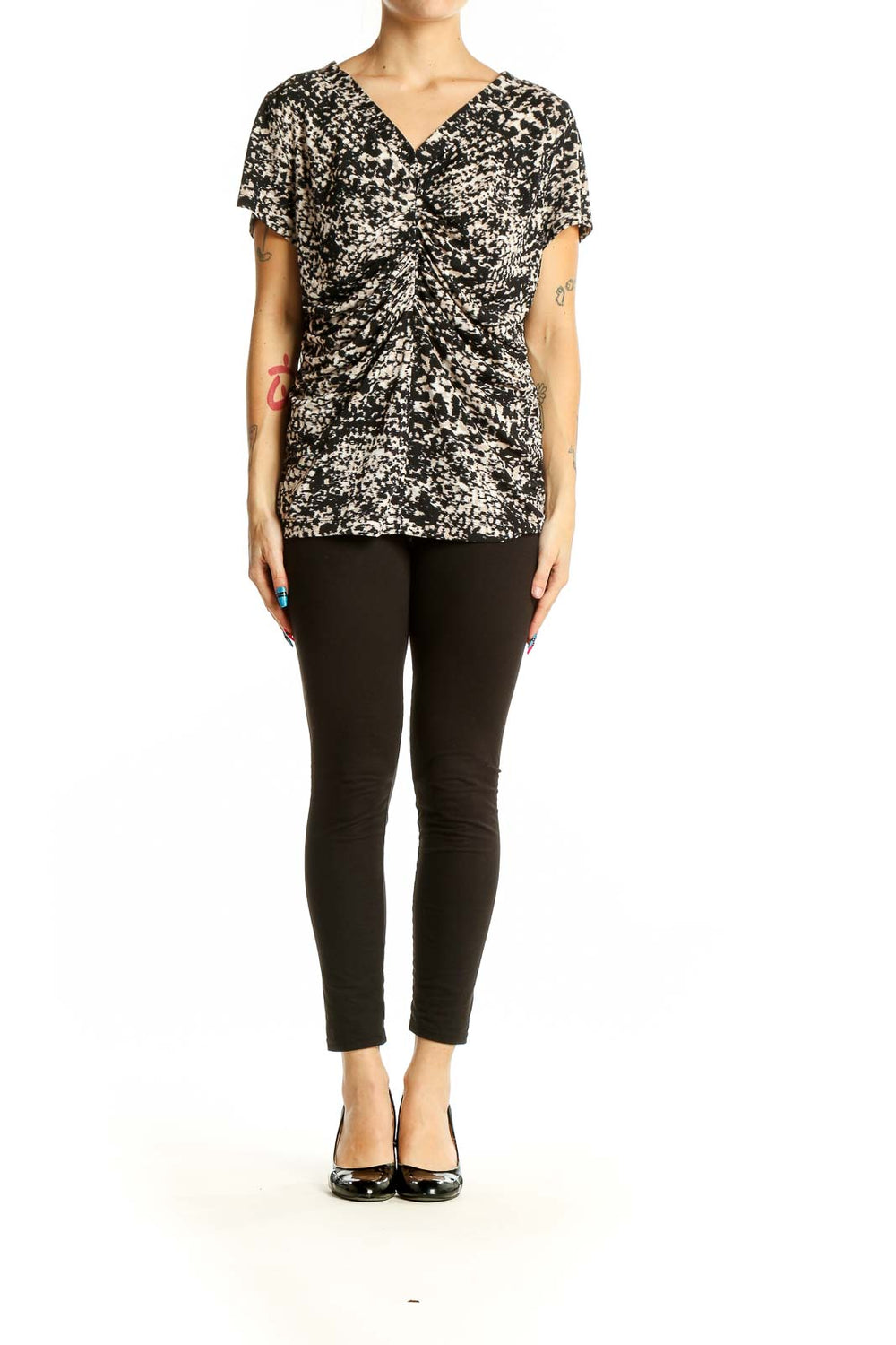 Front view of Alfani black and white speckled V-neck top with gathered front