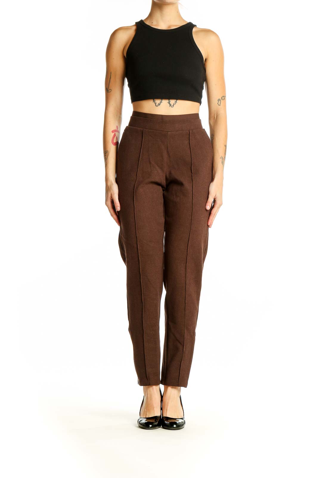 Front view of Athleta brown high-waisted pleated trousers