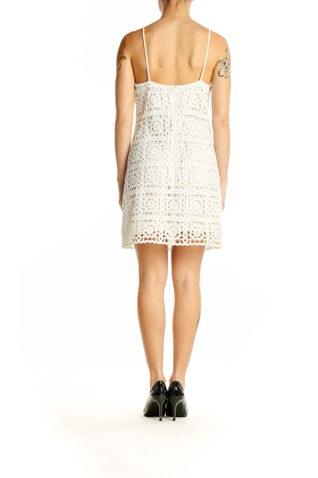 Side view of Zara white crochet lace mini dress showing intricate pattern