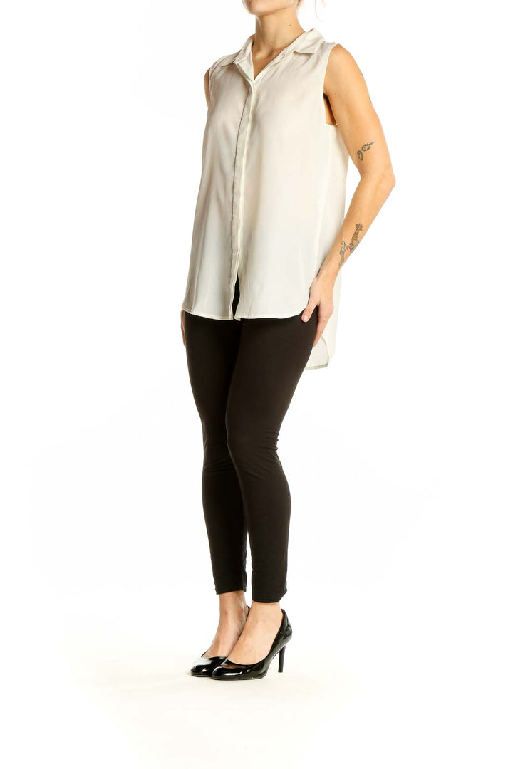 Front view of white sleeveless J.Crew blouse with collar