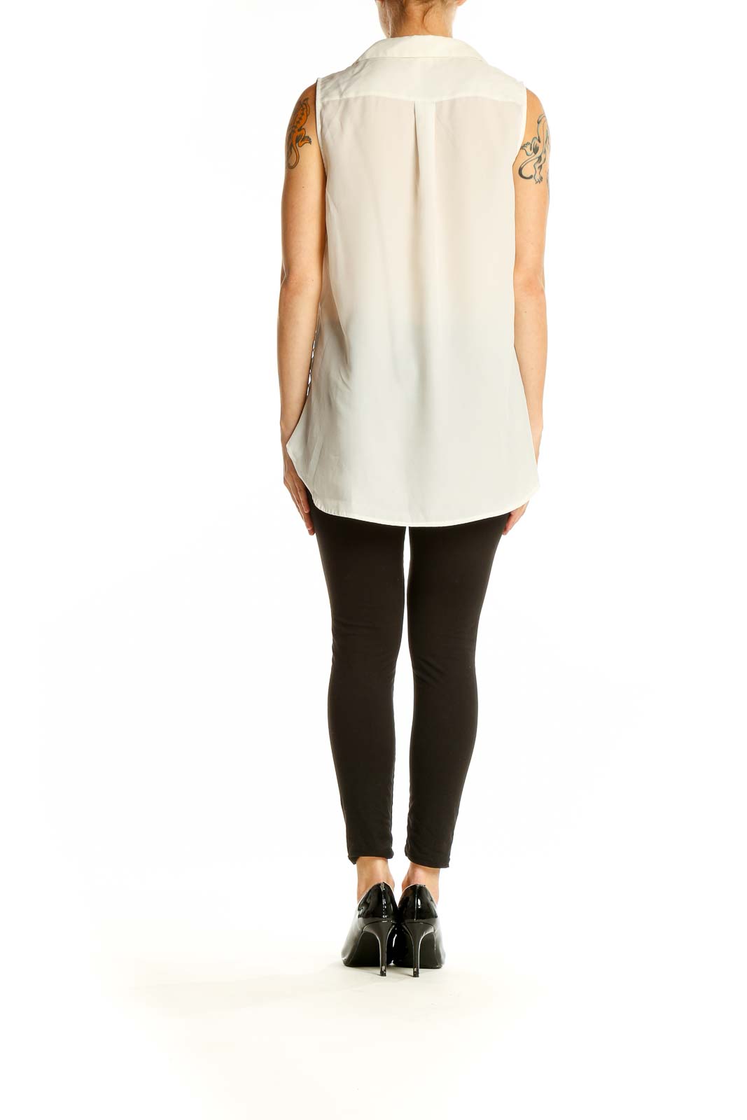 Side view of white sleeveless J.Crew blouse on model