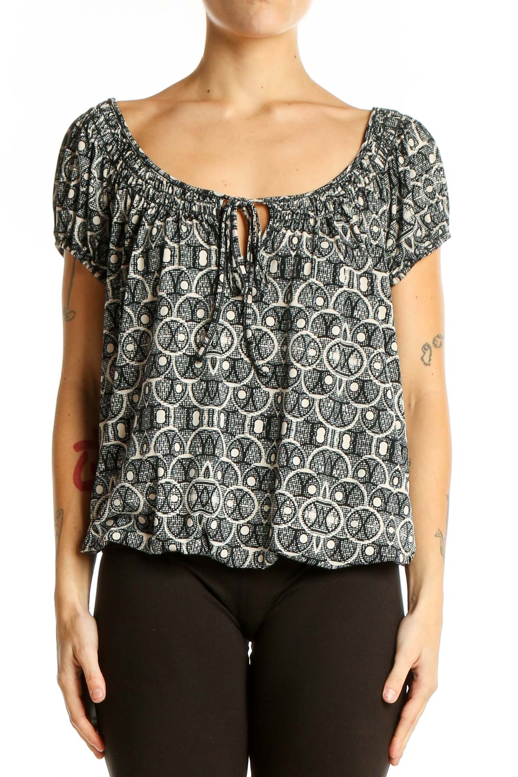 Front view of Max Studio black and white geometric print peasant top