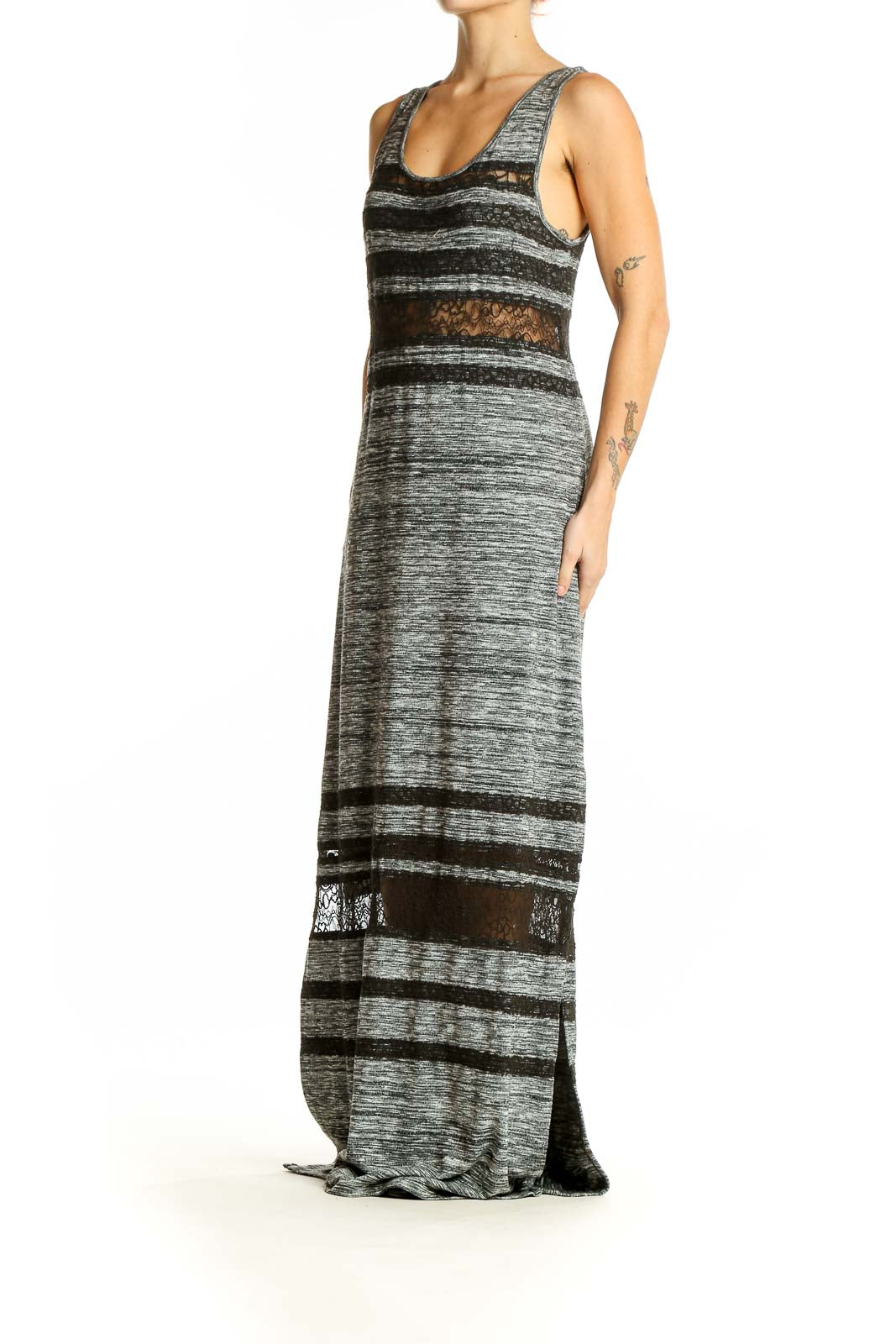 Front view of Free People gray striped maxi dress with lace insets