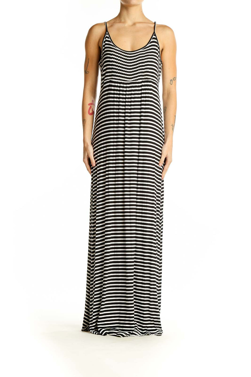 Front view of Calvin Klein black and white striped maxi dress with spaghetti straps