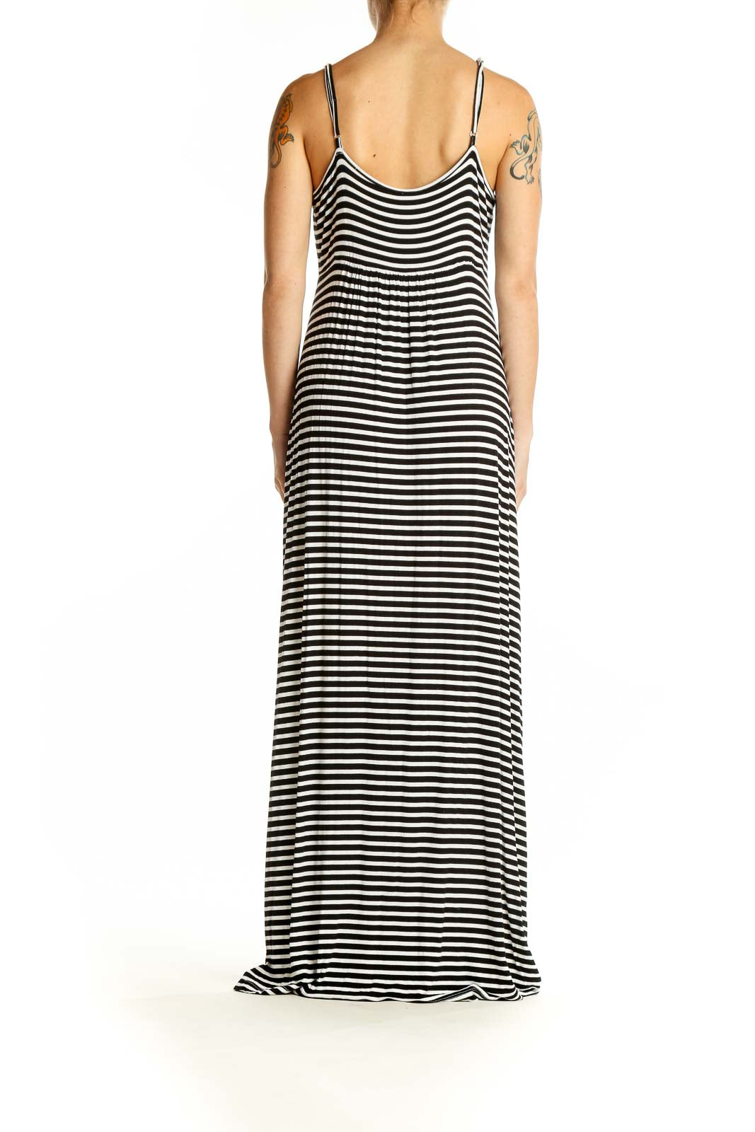 Back view of Calvin Klein black and white striped maxi dress showing full length