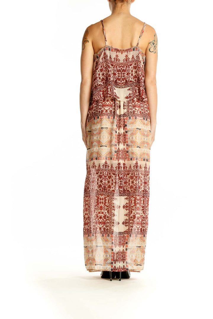 Side view of SilkRoll burgundy floral maxi dress showing flowing skirt