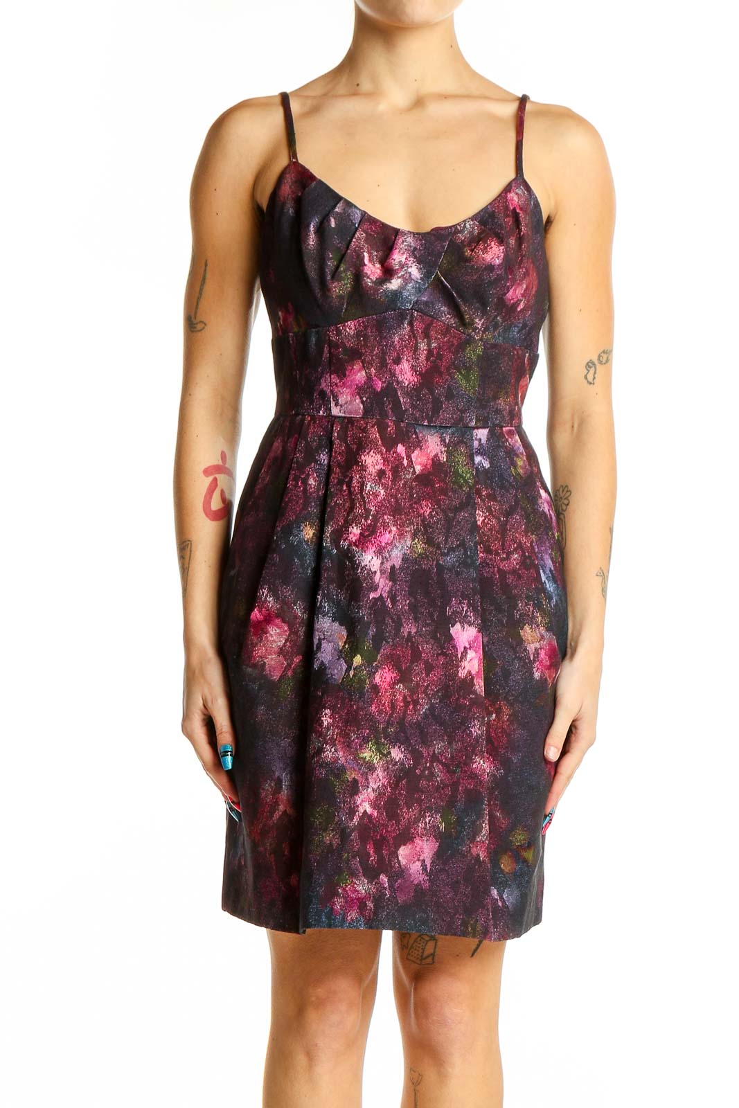 Front view of Nanette Lepore purple floral print cocktail dress with fitted bodice and pleated skirt