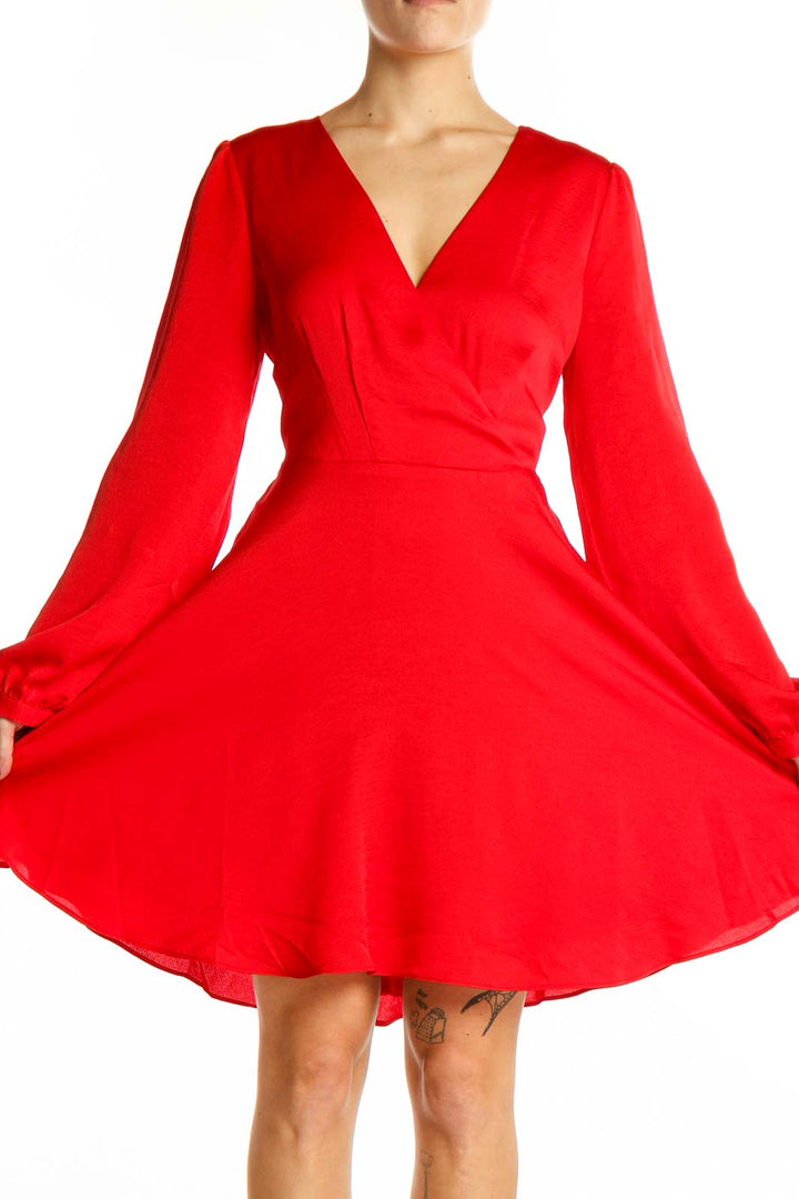 Front view of red Express mini dress with V-neck and flowy sleeves