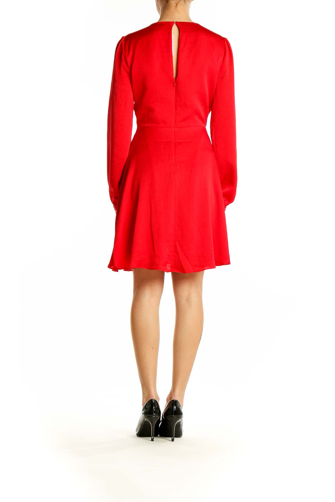 Side view of red Express mini dress showing flowy silhouette