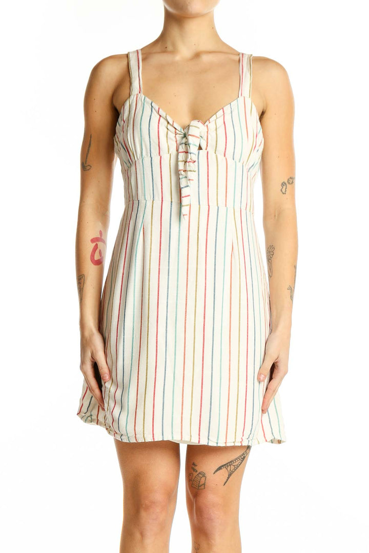 Front view of L.A. Hearts White Multicolor Striped Mini Dress with lace-up neckline