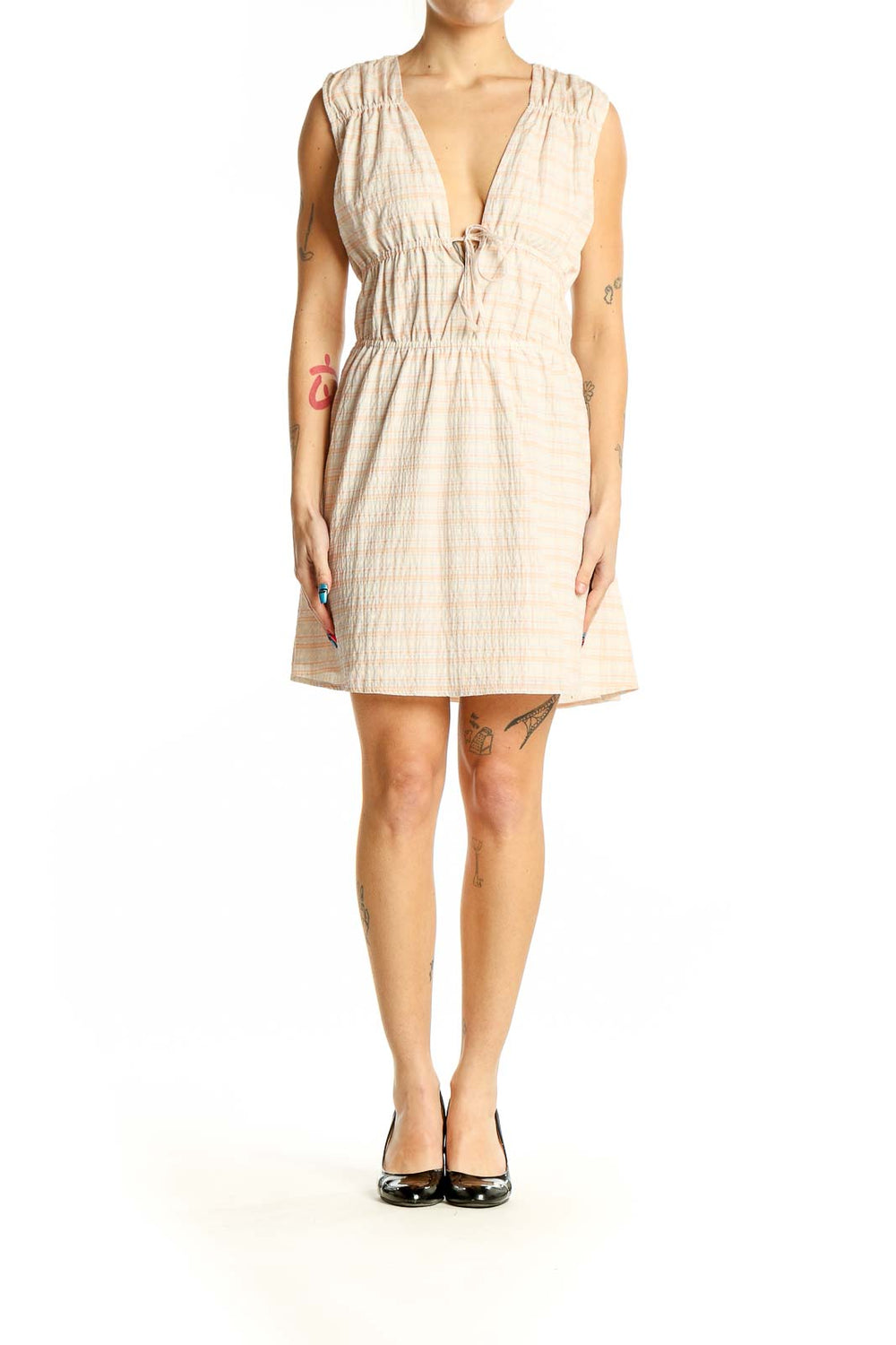 Front view of Treasure & Bond beige plaid sleeveless mini dress with V-neck