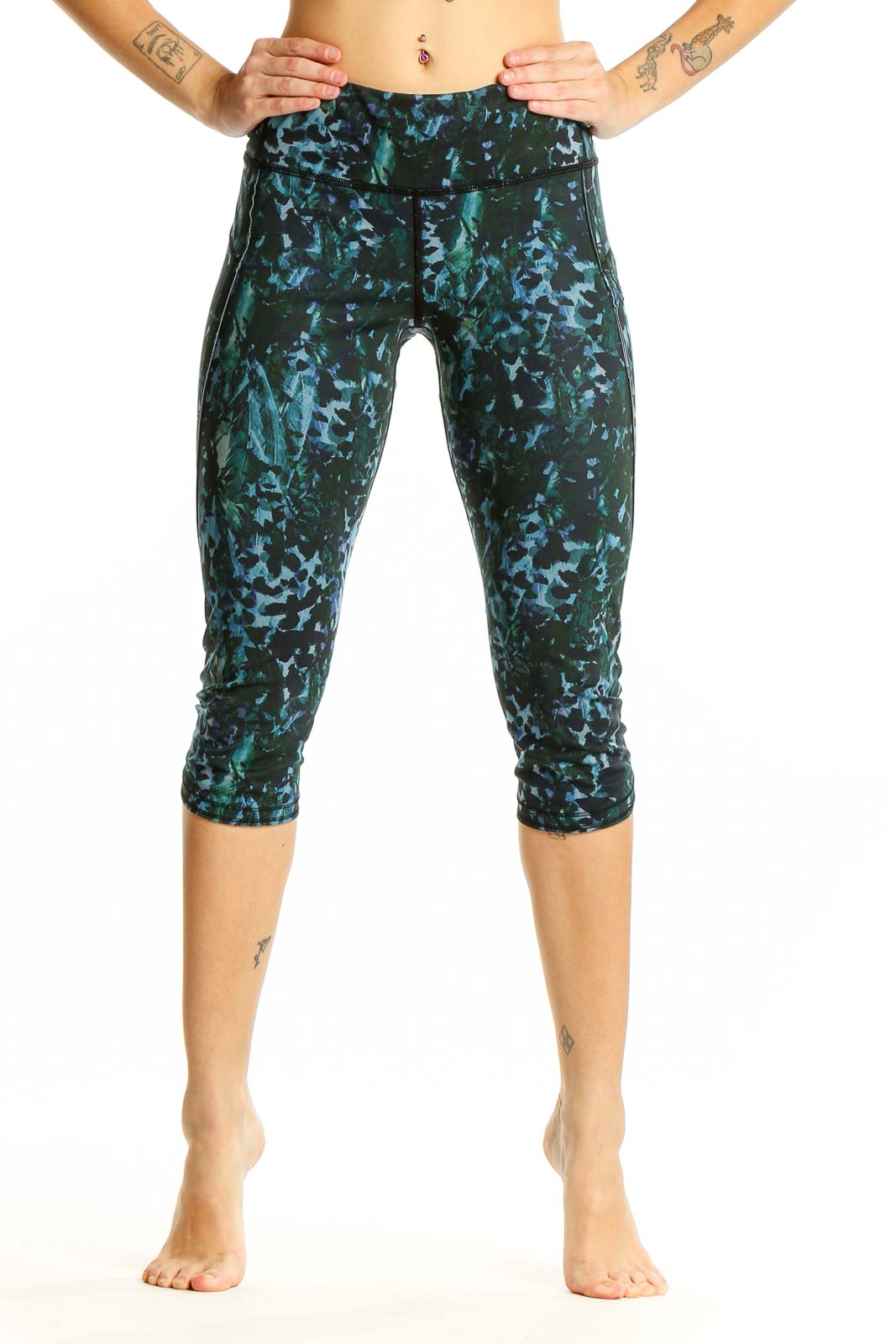 Front view of Lululemon green patterned capri leggings