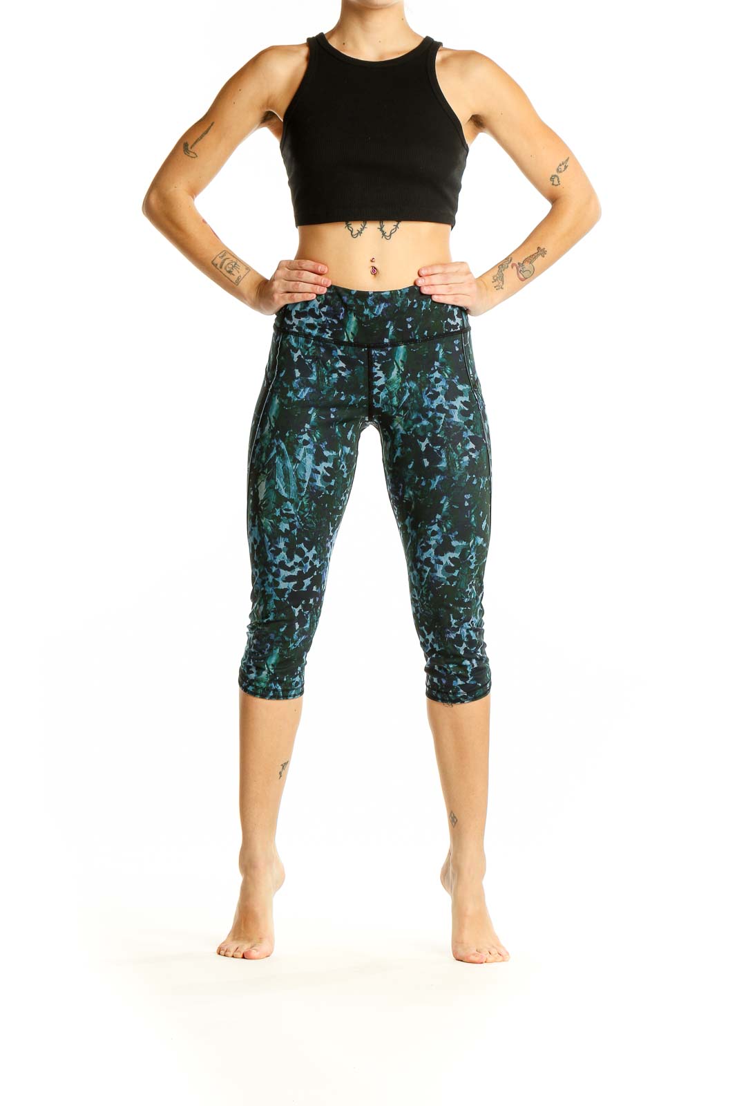 Front view of Lululemon green patterned capri leggings