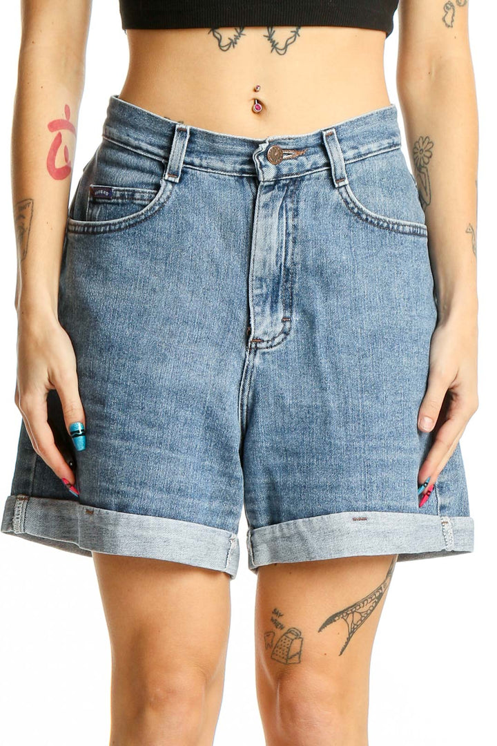 Front view of Riders by Lee light blue high-waisted denim shorts with cuffed hem