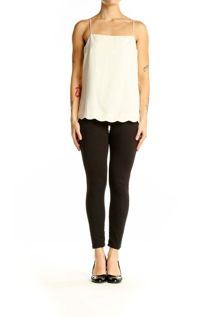 Front view of white J.Crew camisole top with scalloped hem