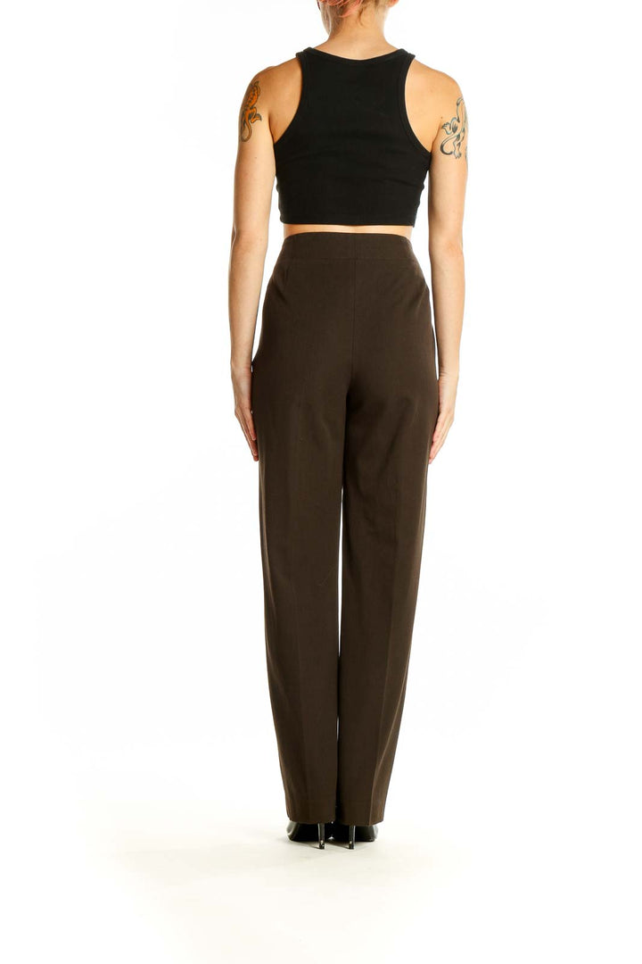 Side view of woman wearing Talbots brown wide-leg dress pants with black top