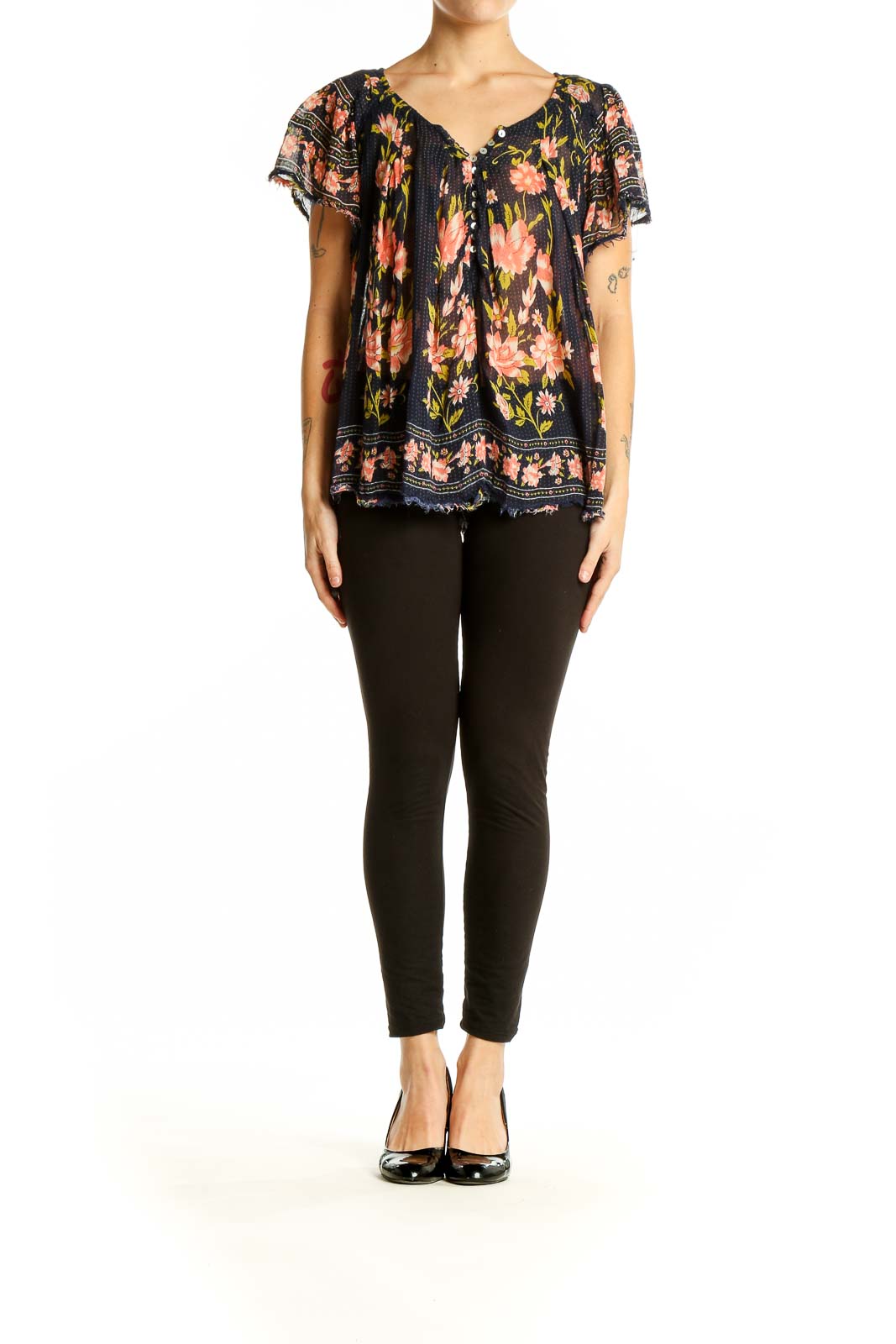 Front view of Free People navy floral peasant top with flutter sleeves