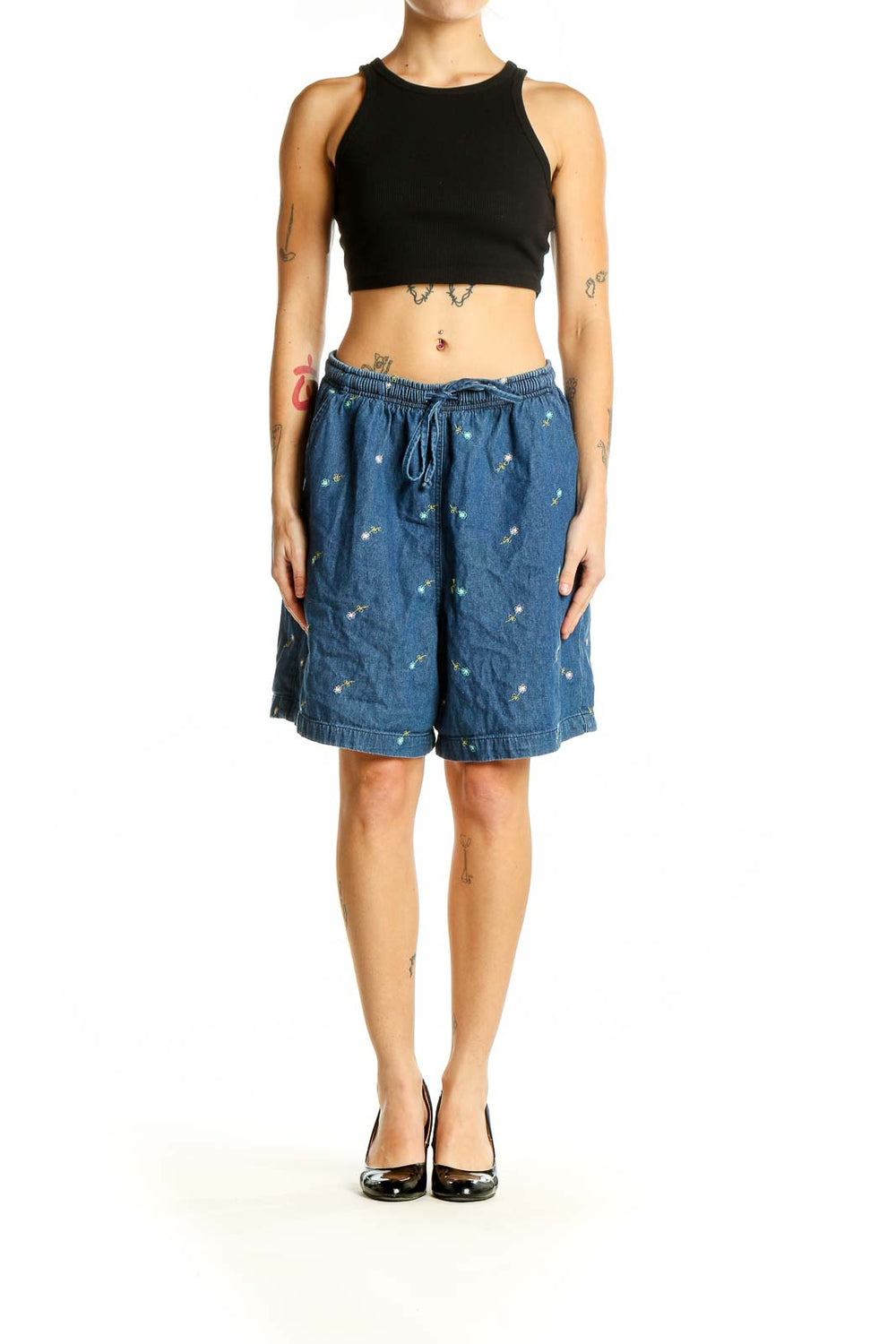 Front view of Erika & Co blue cotton shorts with floral embroidery