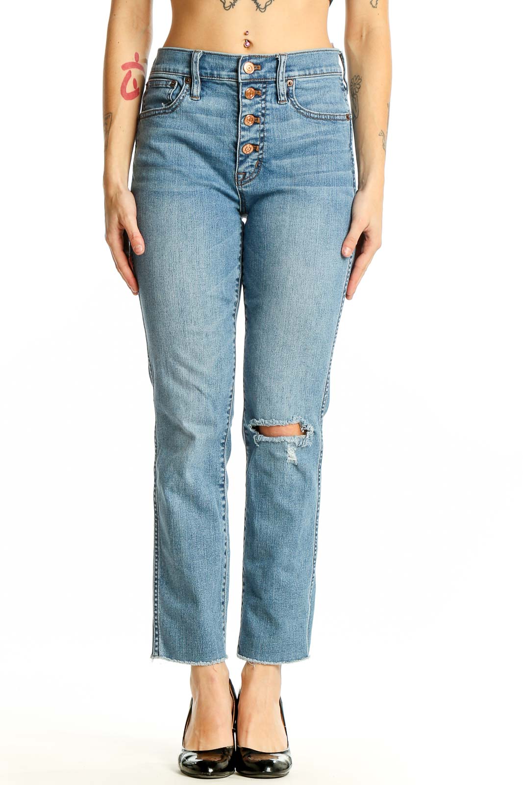 Front view of J.Crew light blue distressed jeans with button-fly closure