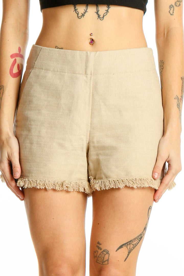 Front view of Ann Taylor LOFT beige frayed hem shorts