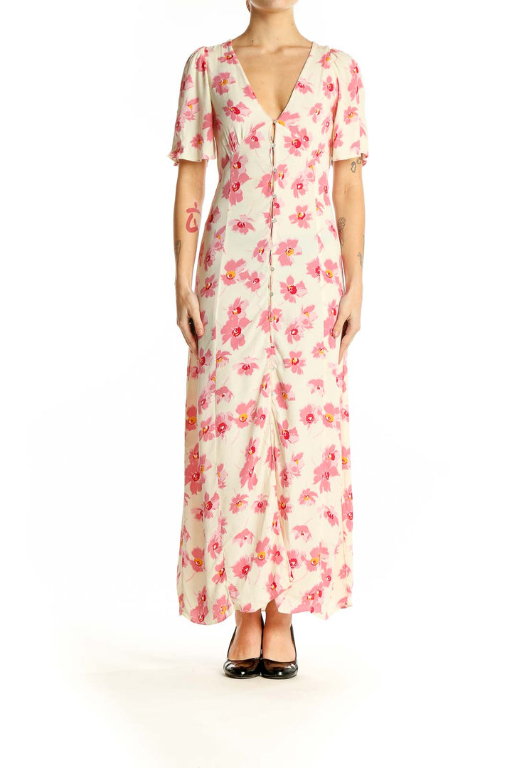 Front view of Zara pink floral maxi dress with V-neck and flutter sleeves