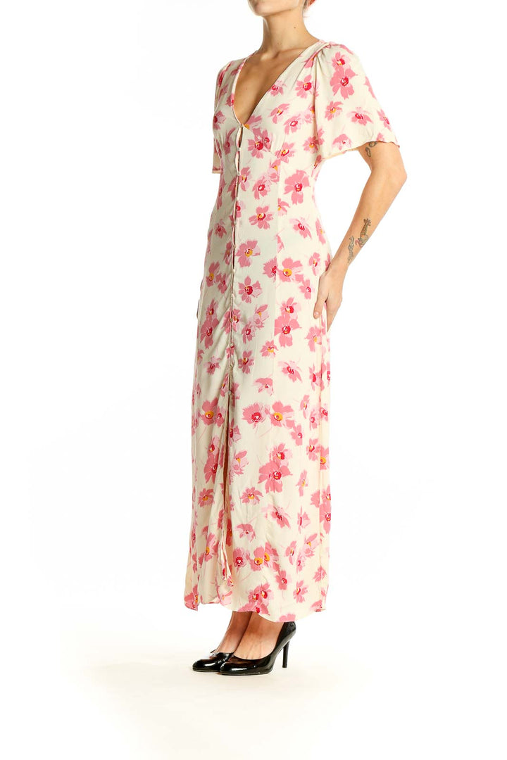 Front view of Zara pink floral maxi dress with V-neck and flutter sleeves