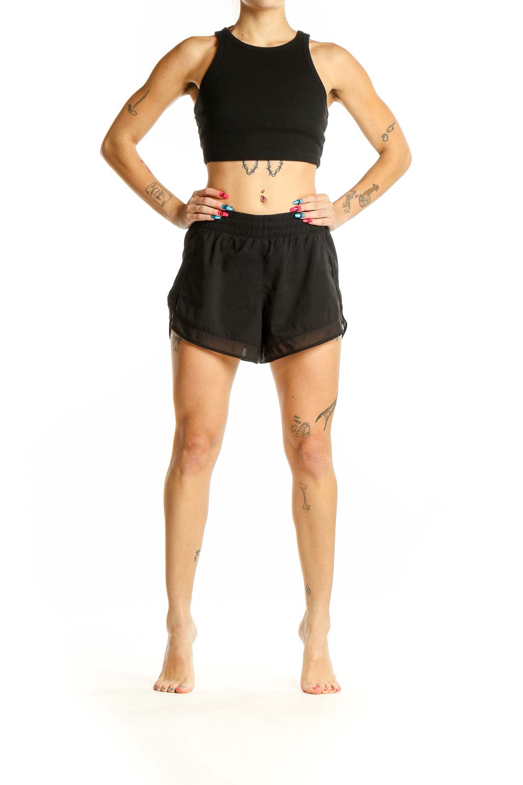 Front view of black Athleta activewear set with crop top and shorts