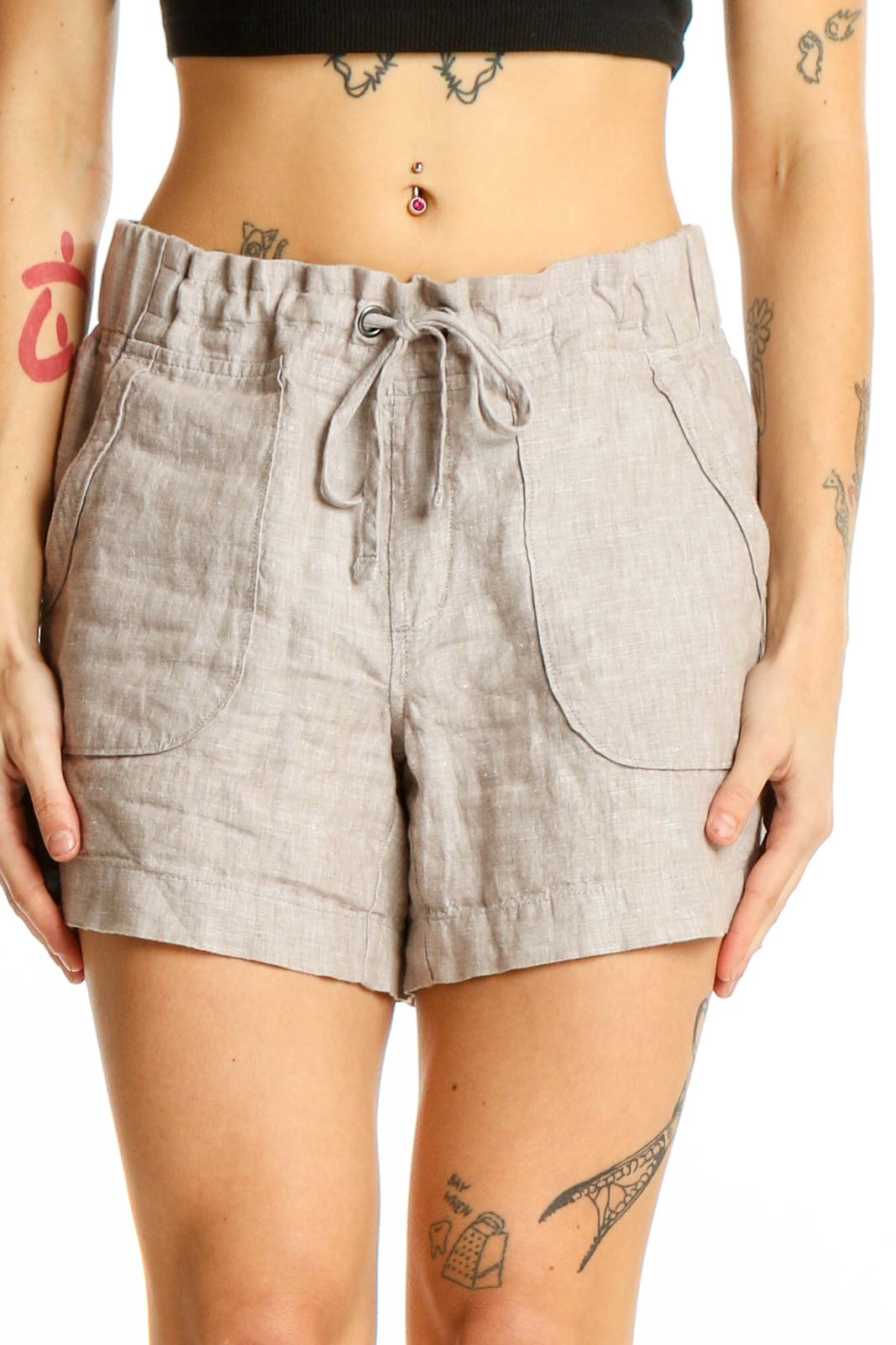 Front view of Athleta beige linen drawstring shorts