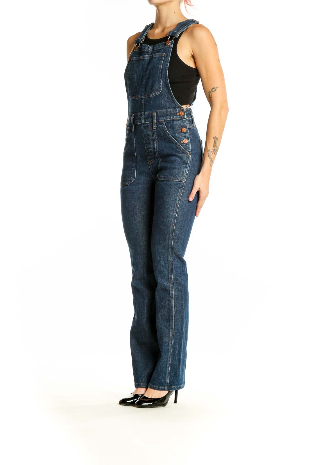 Front view of Madewell blue denim straight-leg overalls on model