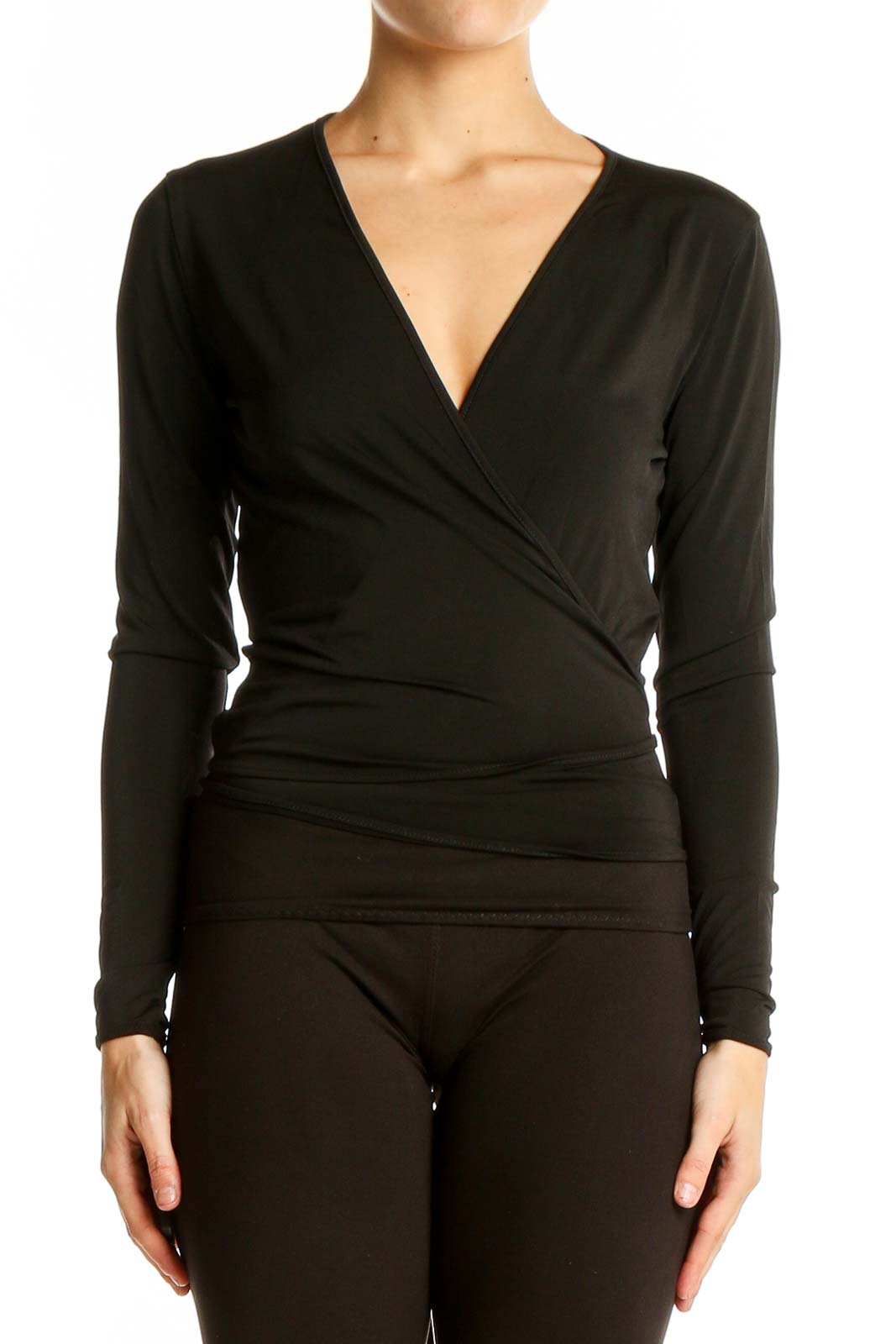 Front view of black wrap-style long sleeve top from Mango