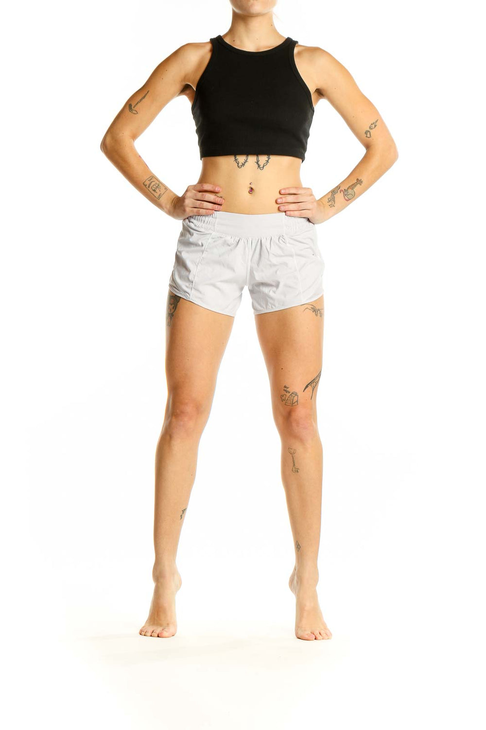 Front view of white Lululemon athletic shorts with side pockets