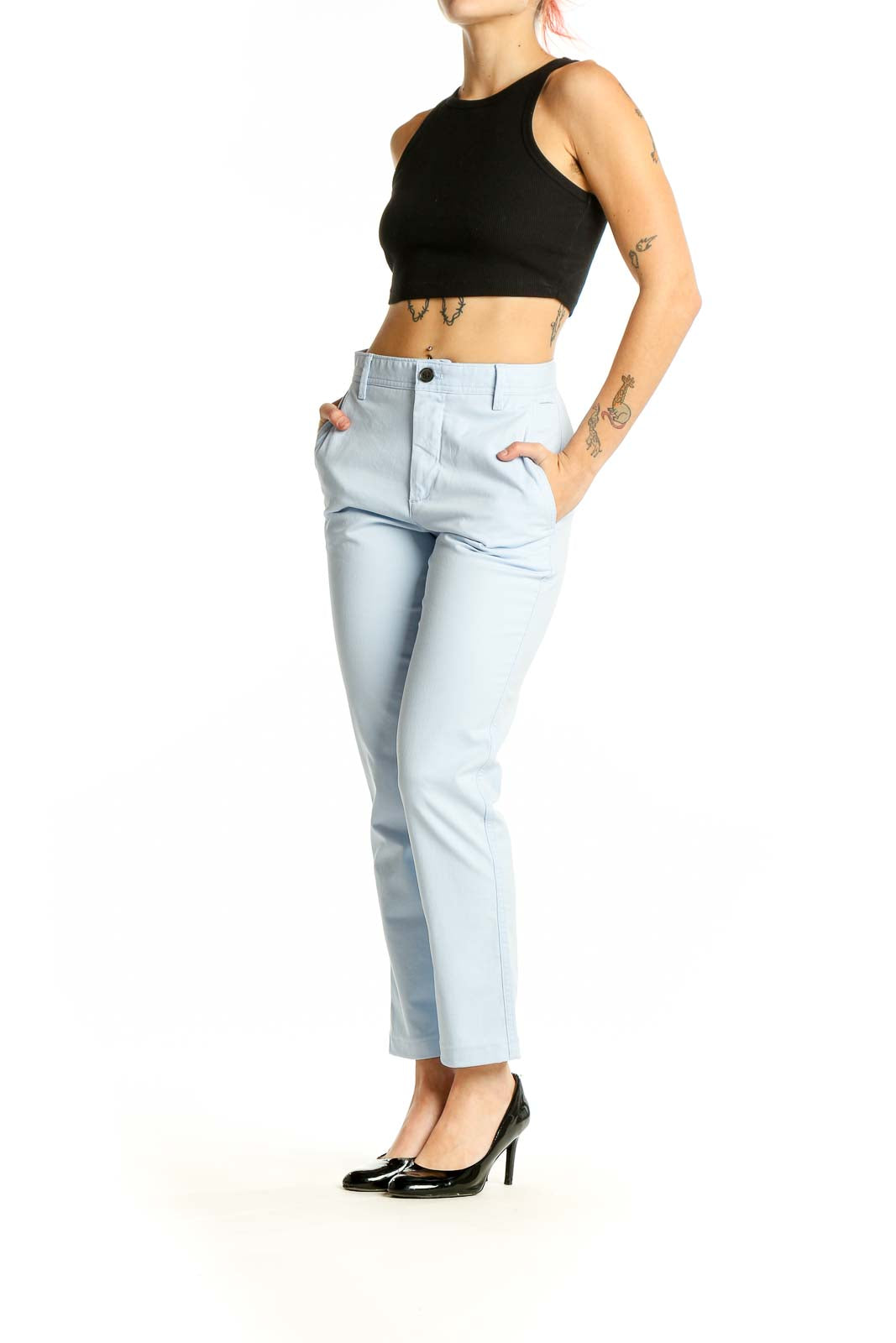 Front view of light blue Banana Republic ankle pants on model