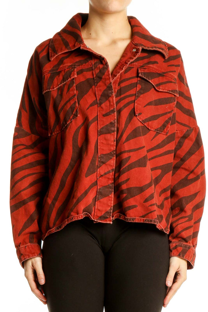 Front view of red zebra print cropped jacket from Zara