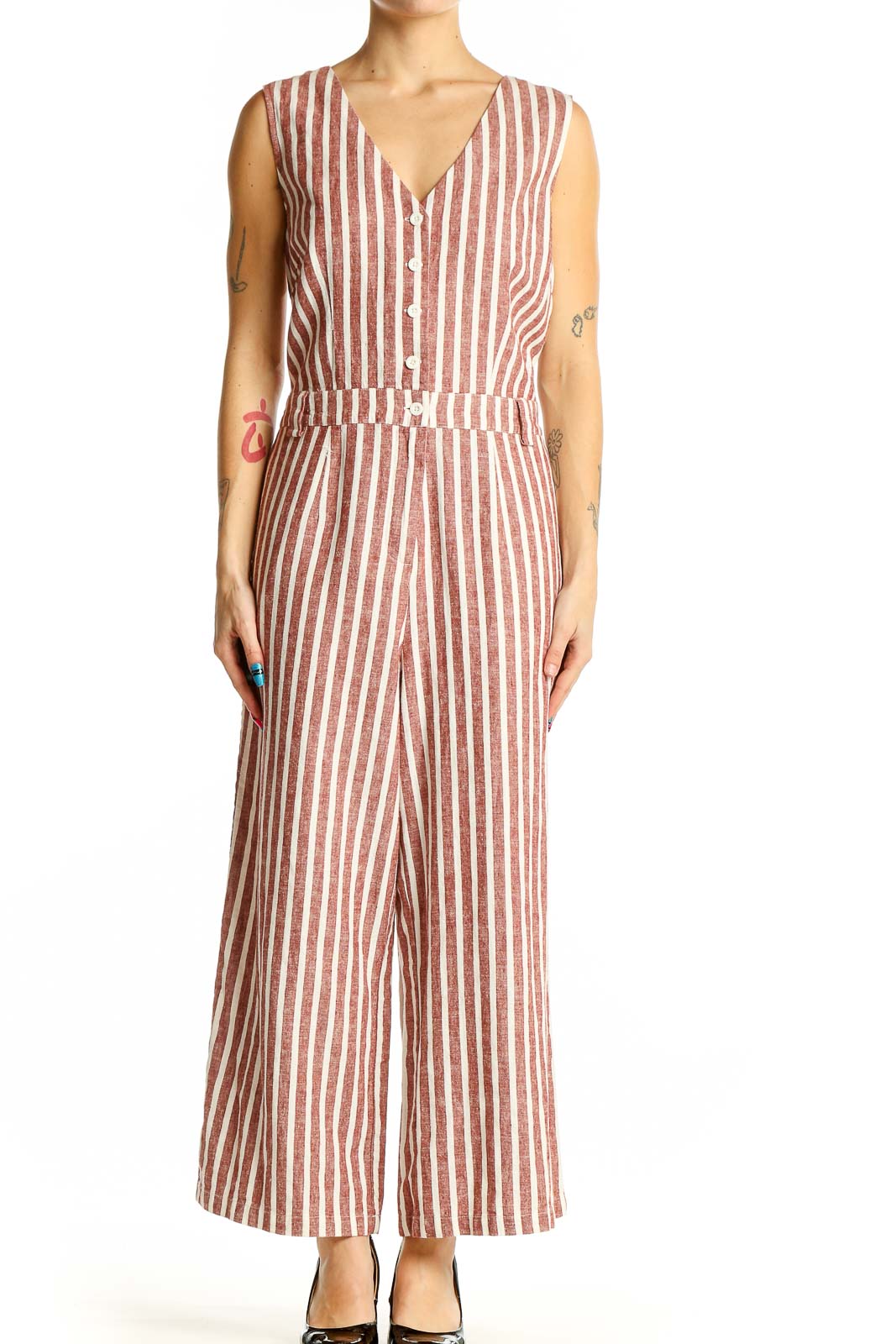 Front view of Boden rust striped sleeveless jumpsuit with V-neck and button-front closure