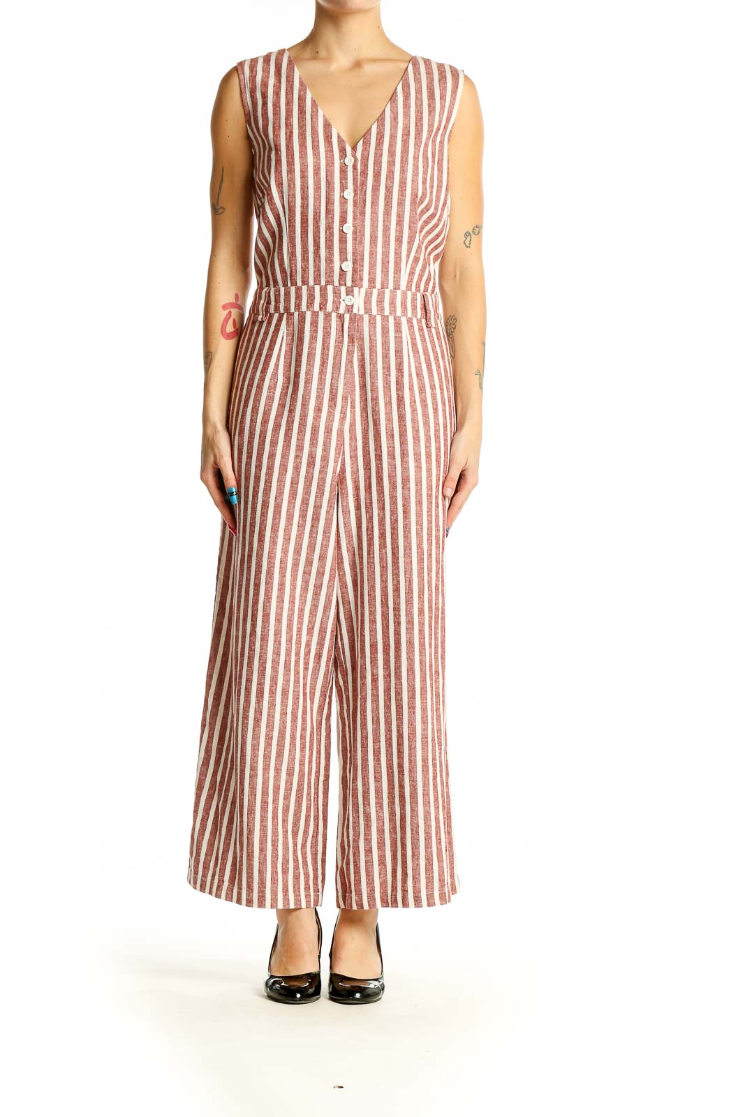 Front view of Boden rust striped sleeveless jumpsuit with V-neck and button-front closure