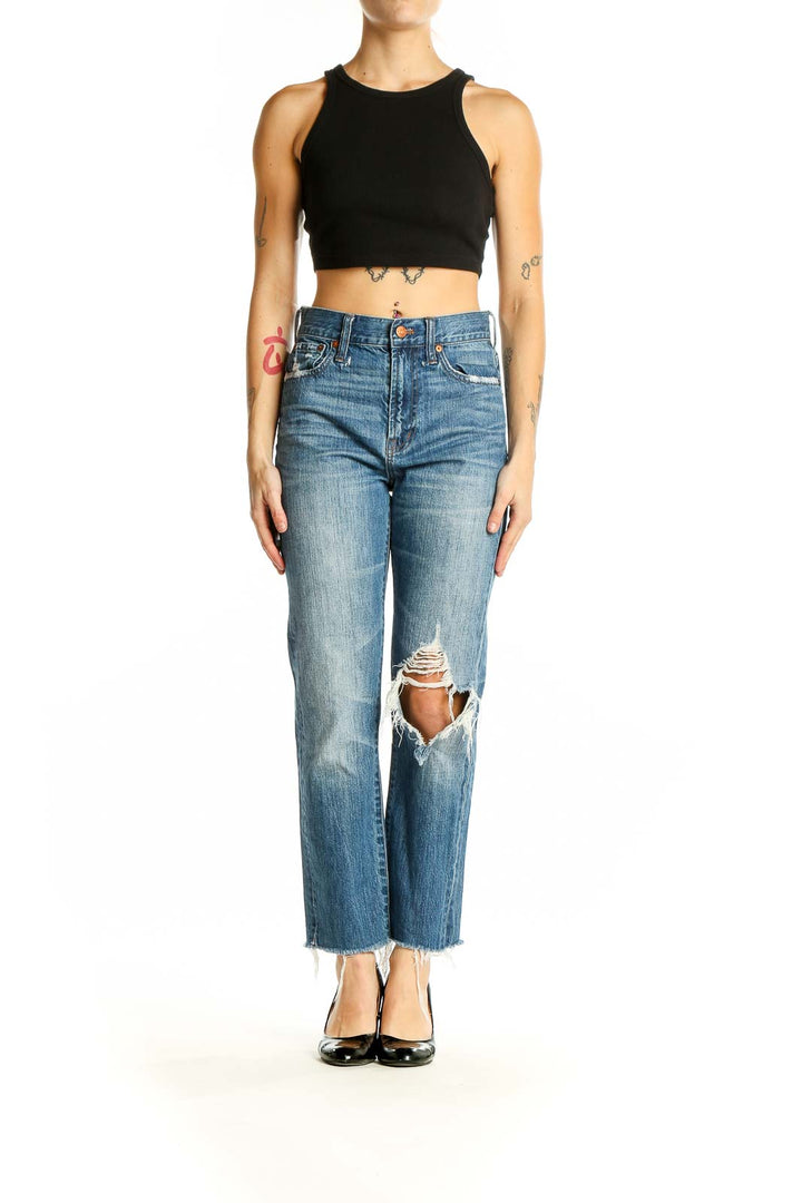 Front view of Madewell blue high-rise straight leg jeans with distressed knee