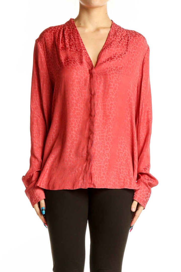 Front view of coral Halogen blouse with V-neckline and textured pattern