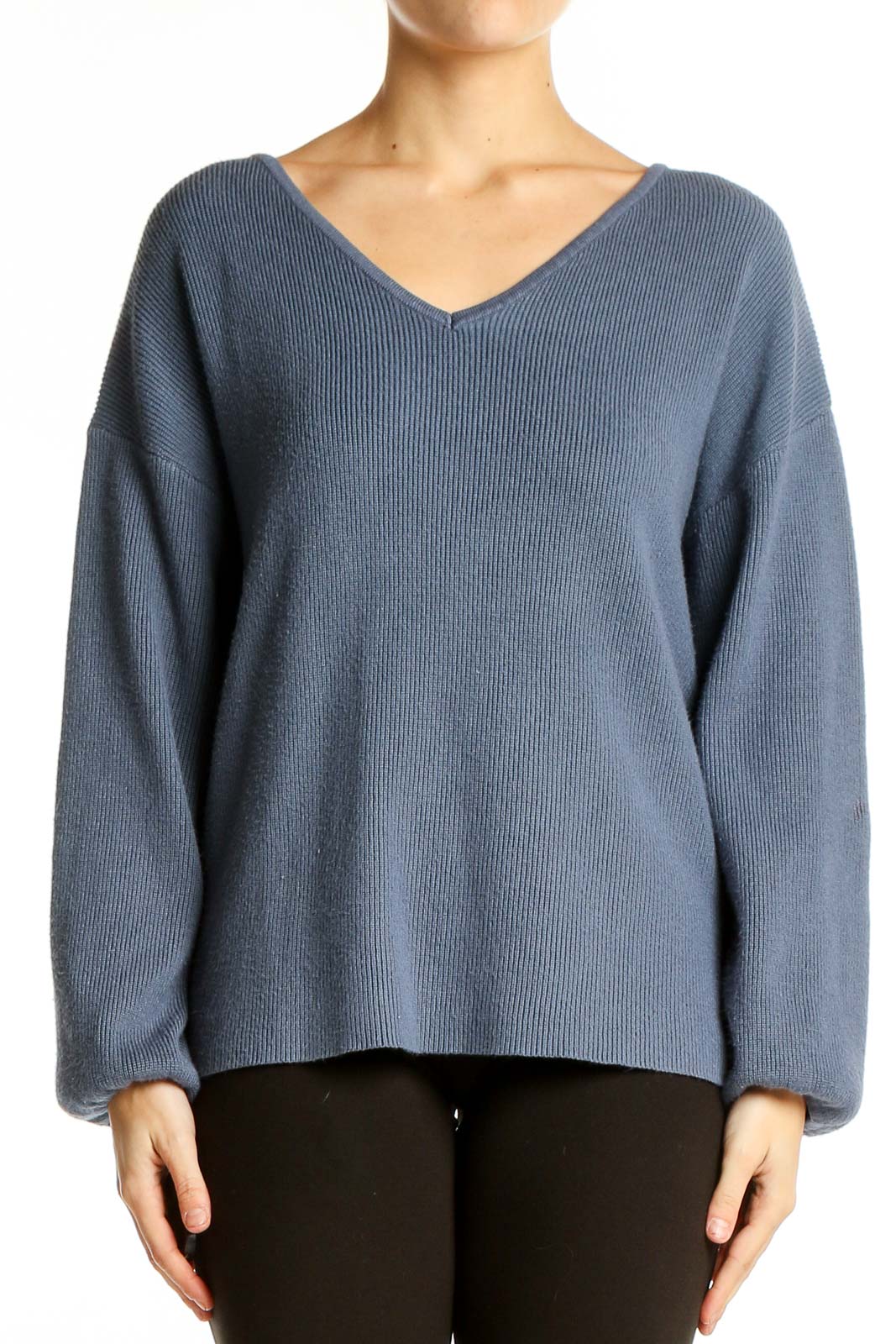 Front view of SilkRoll blue ribbed V-neck sweater on model