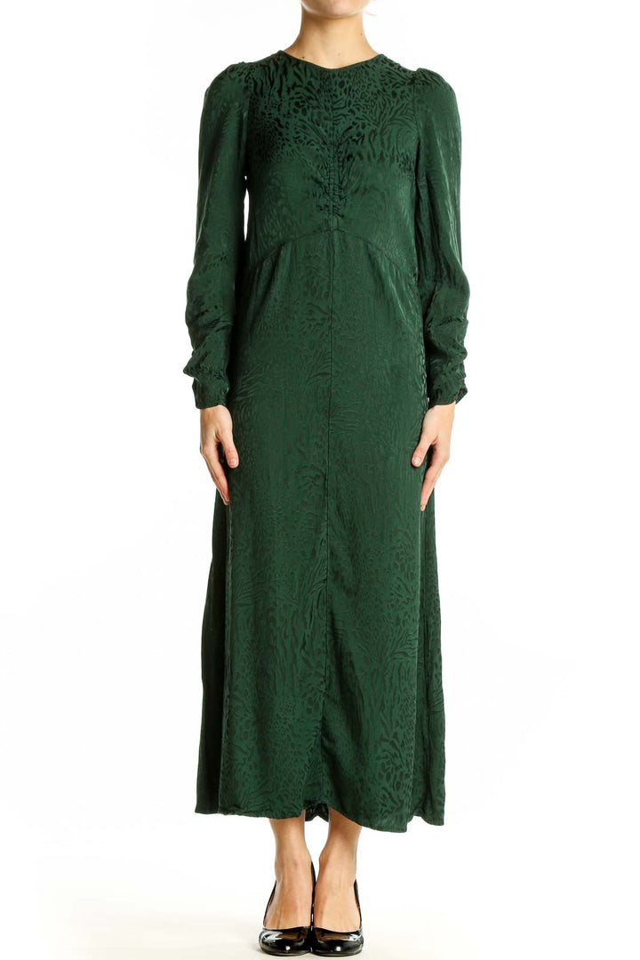 Front view of green textured long sleeve maxi dress by SilkRoll