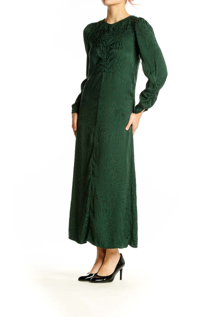 Front view of green textured long sleeve maxi dress by SilkRoll