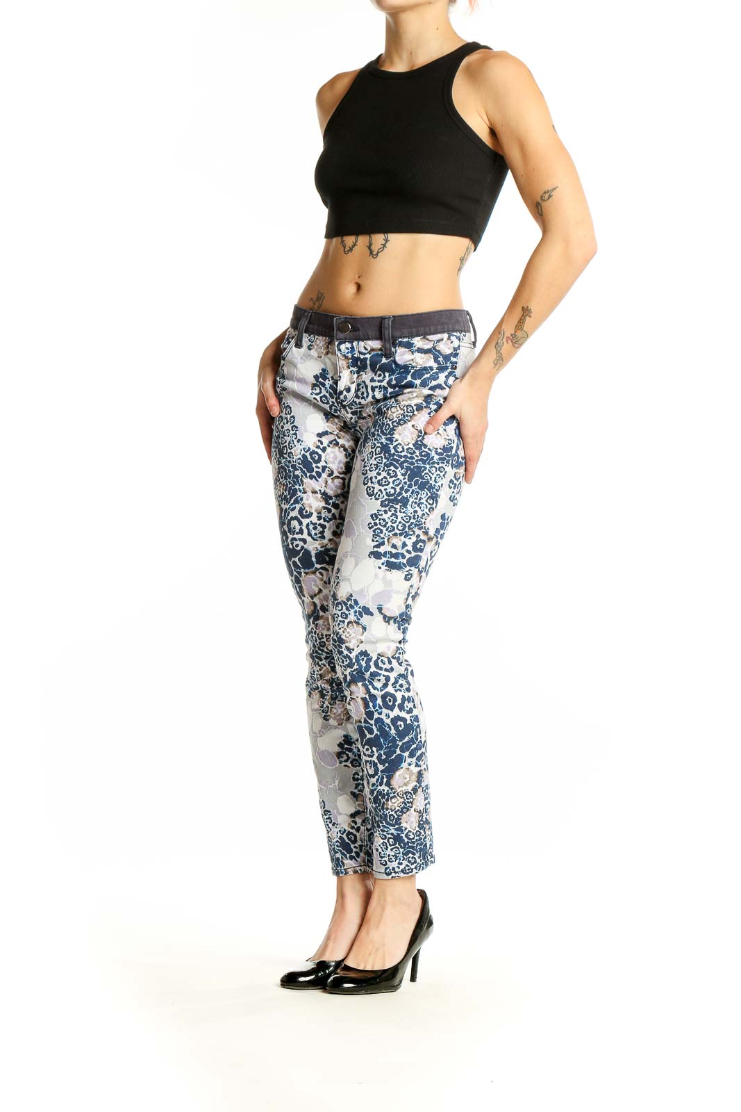 Front view of DKNY blue and white floral leopard print slim-fit jeans