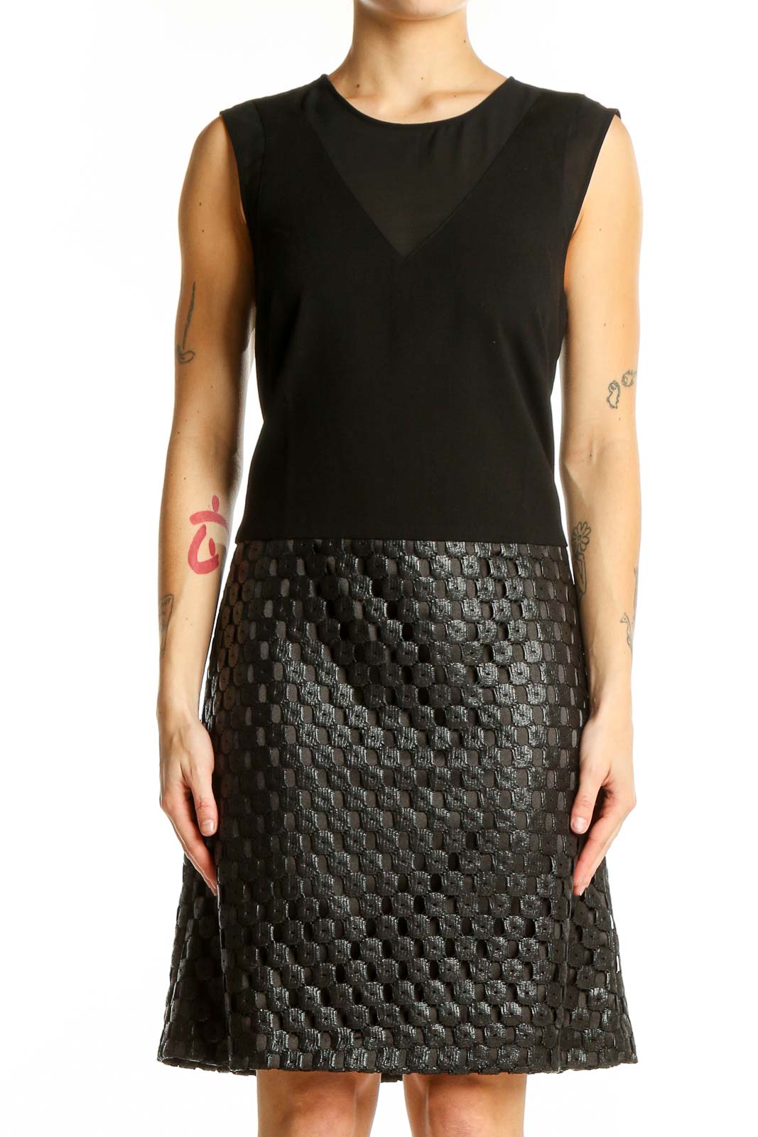 Front view of Banana Republic black sleeveless cocktail dress with textured skirt