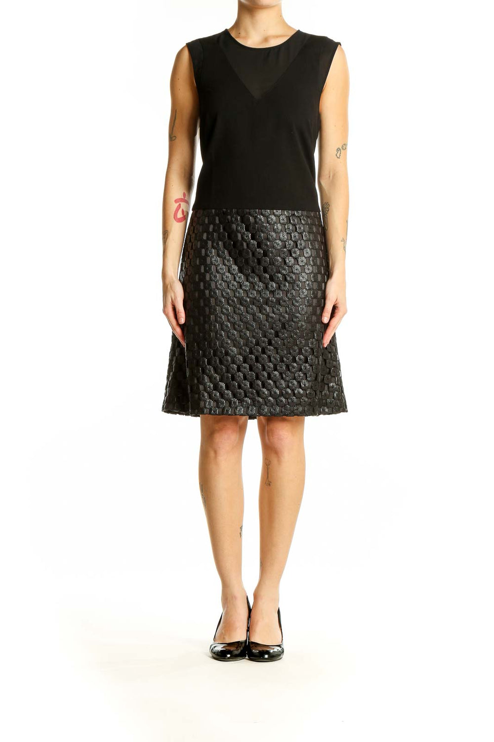 Front view of Banana Republic black sleeveless cocktail dress with textured skirt