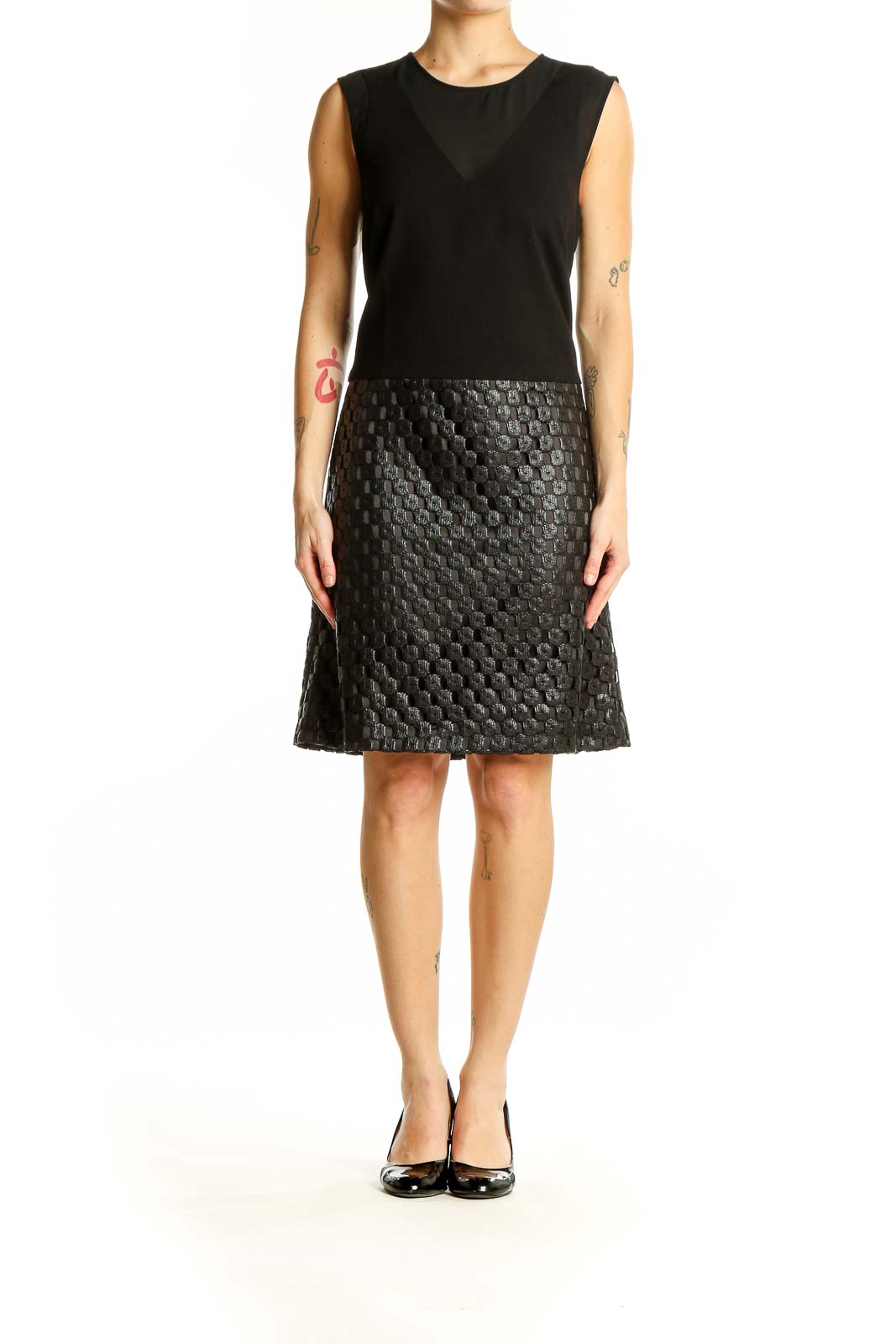 Front view of Banana Republic black sleeveless cocktail dress with textured skirt