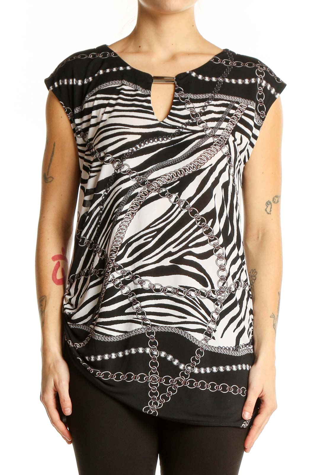 Front view of Cache black and white zebra print sleeveless top with chain pattern