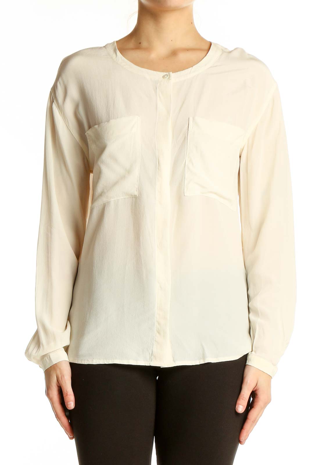 Front view of Everlane ivory silk long-sleeve blouse with patch pockets