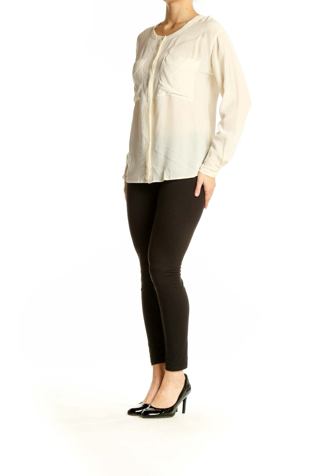 Front view of Everlane ivory silk long-sleeve blouse with patch pockets