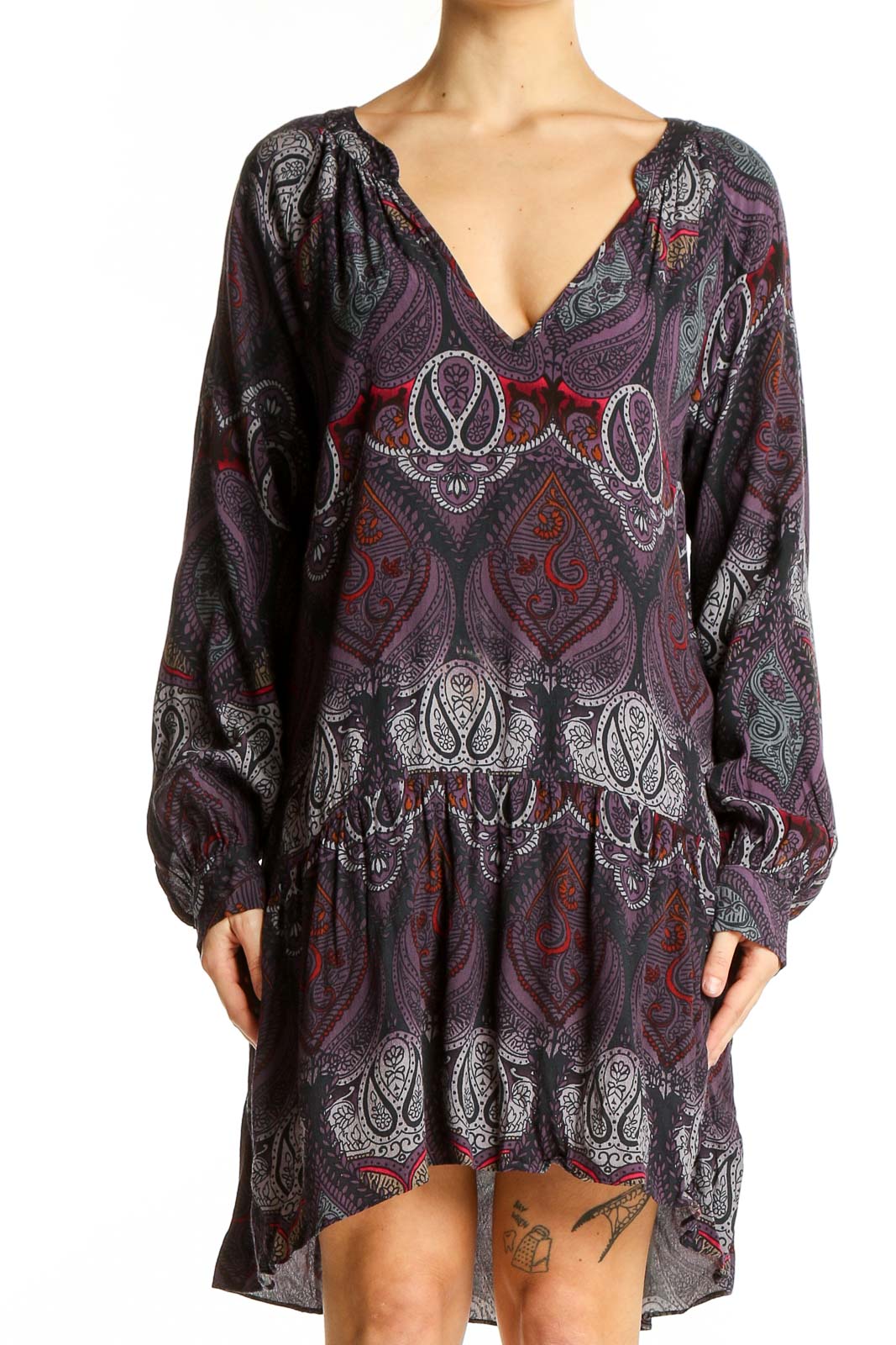 Front view of Sanctuary purple paisley mini dress with V-neckline and long sleeves