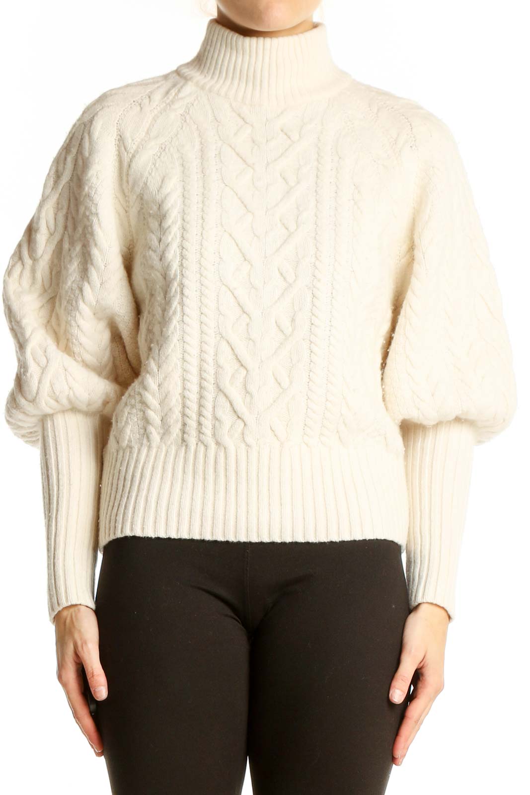 Front view of BCBG MaxAzria cream cable knit turtleneck sweater with balloon sleeves