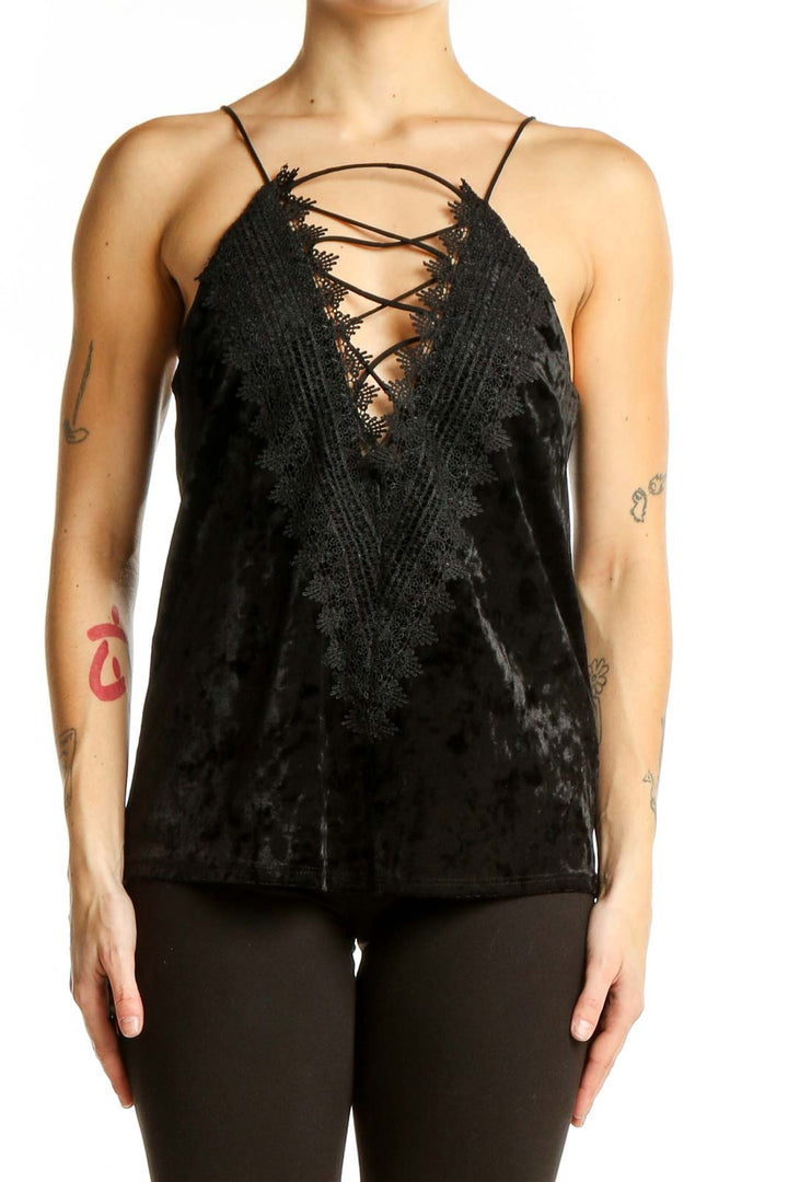 Front view of Wayf black velvet camisole top with lace-up V-neckline